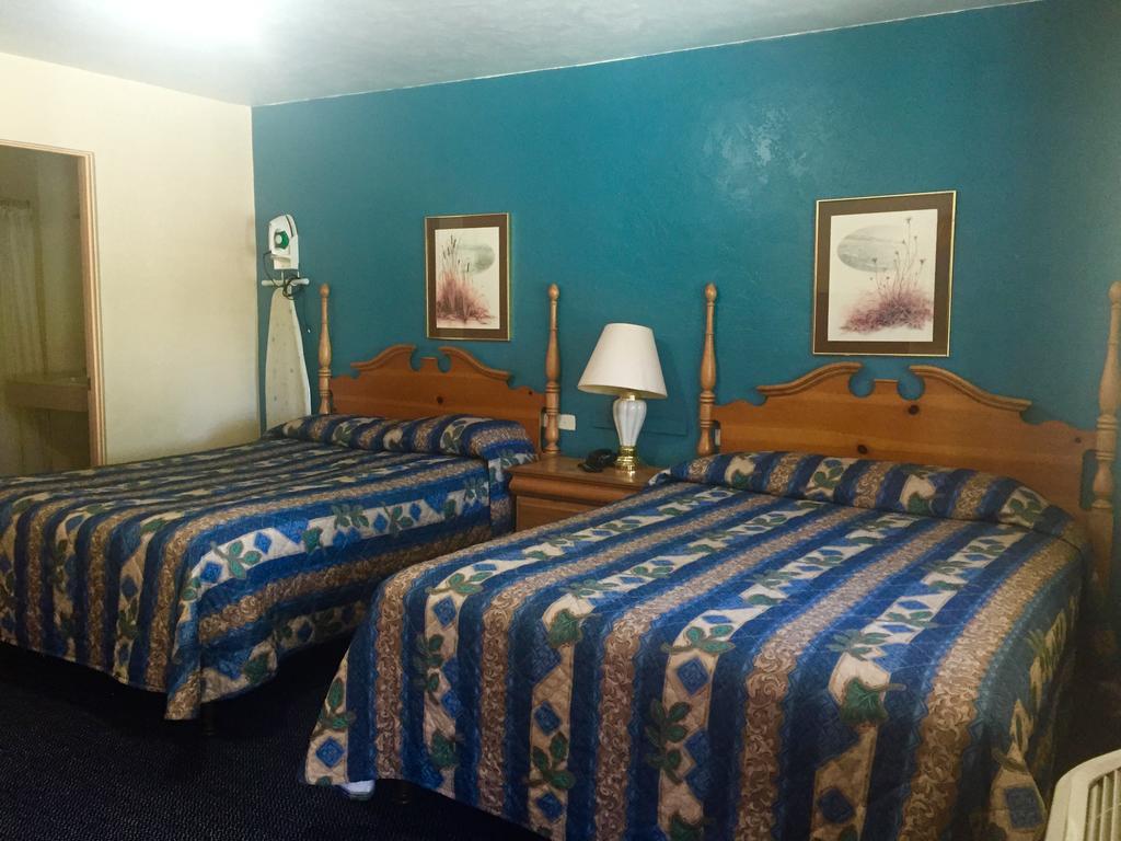 Paradise Inn الغرفة الصورة
